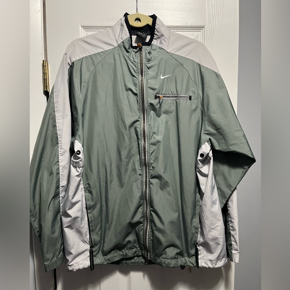 Nike sage green windbreaker. Nice, light running jacket.